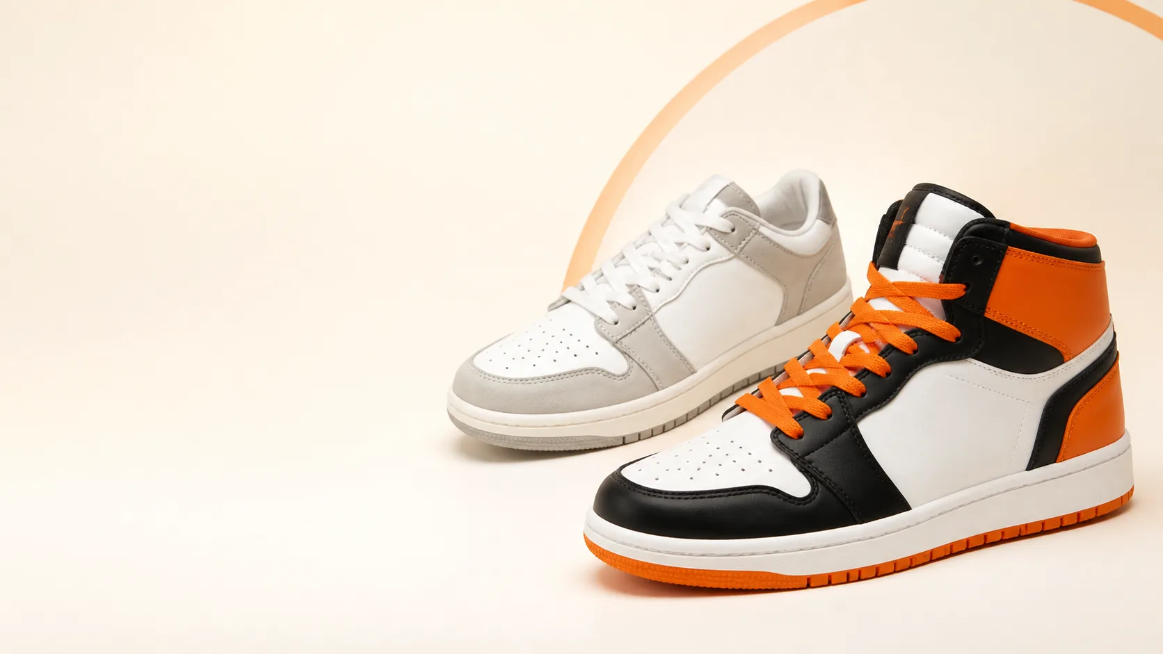 Black, white, and orange high-top sneaker with a neutral white sneaker